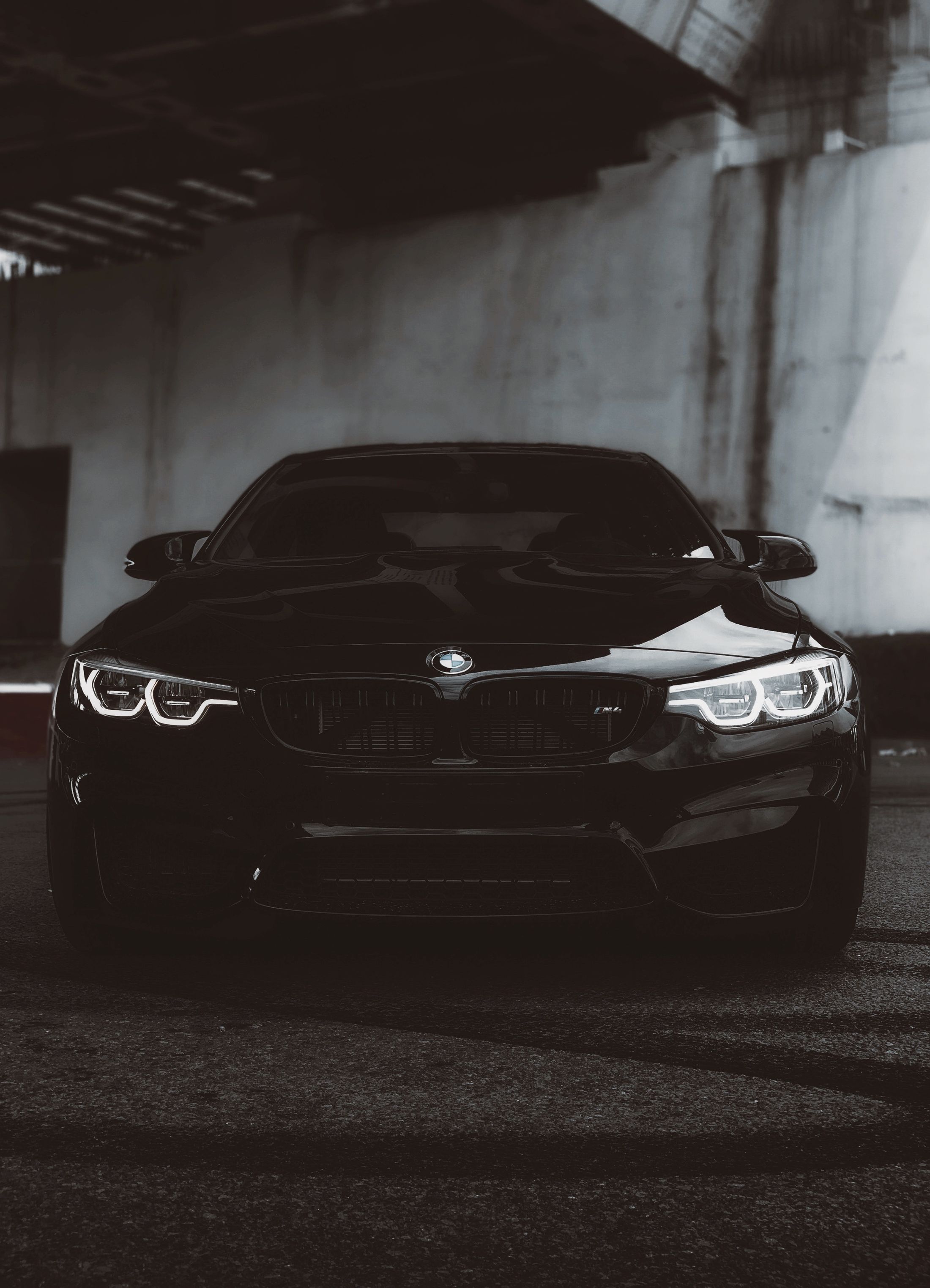 Black BMW M4 with a clean, reflective paint finish